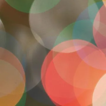 Colourful festive multi-colored circles . Defocused abstract multicolored bok Stock Photos