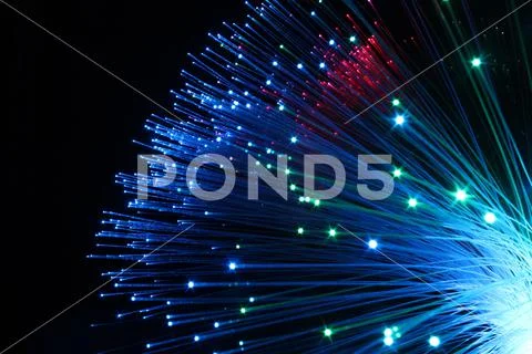 Colourful fibre optic lamp close-up photograph showing single glowing fibres Stock Photos