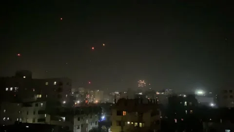 Colourful Fireworks Exploding Over Silhouette Of Buildings In Dhaka. Stock Footage 169143635