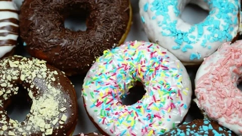 Colourful Glazed Donuts Assortment Close Up 4K Macro Sweet Dessert Pastry Vidéo 341281947