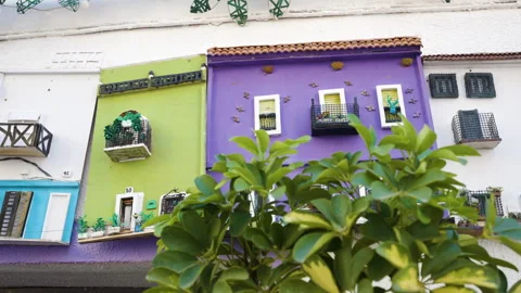 Colourful Hanging Decorations Models Of House Fronts In Old Spanish Town 스톡 동영상 254827167