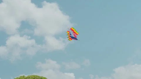 Colourful kite flying in blue sky , Nusa Dua, Bali 動画素材 336515236