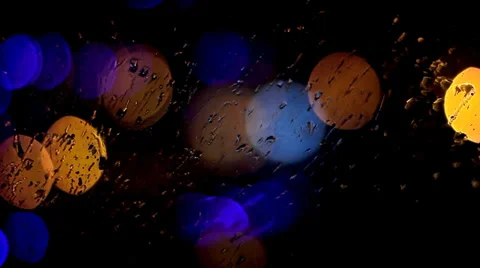 Colourful Light Reflections on Window in Rain at Night HD Видео 36840453