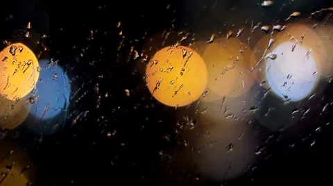 Colourful Light Reflections on Window in Rain at Night HD Видео 36883411