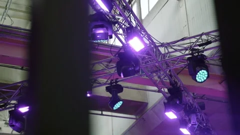 Colourful lighting in ceiling preparing for event 動画素材 171585595