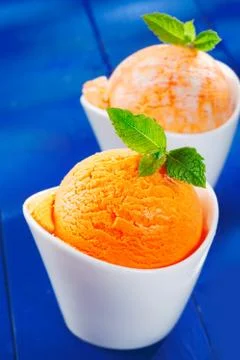 Colourful orange icecream Stock Photos