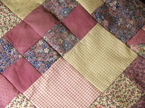 Colourful patchwork in different check and flower patterns Foto stock