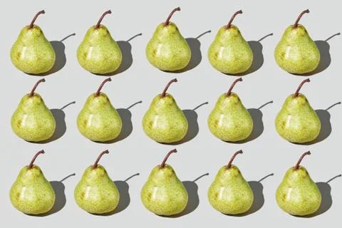 Colourful pattern of pears on grey background. View from top. Stock Photos