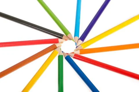 Colourful pencils ordered in circle Stock Photos