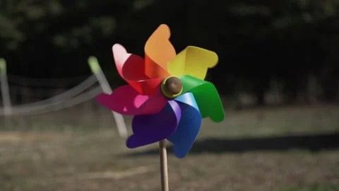 Colourful pinwheel moved by the wind Video stock 230666447