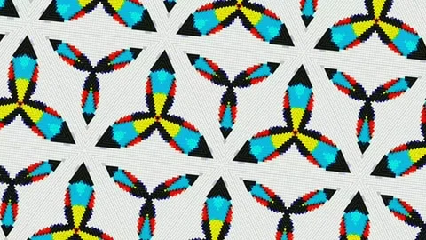 Colourful pixel petal pattern on white background, spinning graphic Stock Footage 133395405