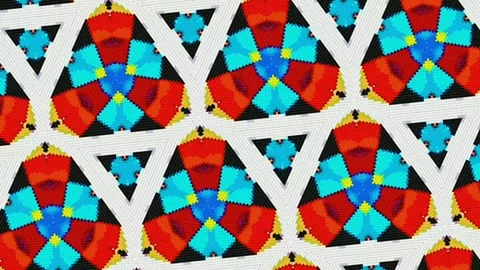 Colourful pixel triangle pattern on white background, spinning graphic Stock Footage 133395409