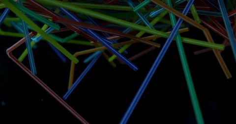 Colourful Plastic Straws Floating Around In The Sea. Plastic Pollution Polluting Stock Footage 112838079