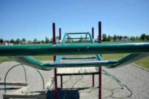 Colourful playground monkey bars in school yard. Stock Photos