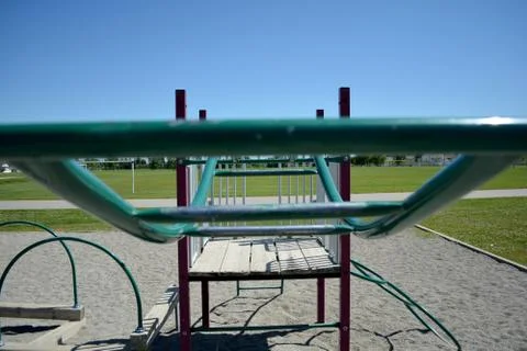 Colourful playground monkey bars in school yard. Stock Photos