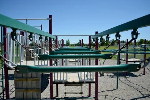 Colourful playground monkey bars in school yard. Stock Photos