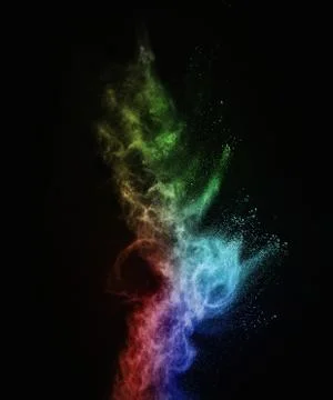 Colourful powder exploding isolated on black Stockfoto's