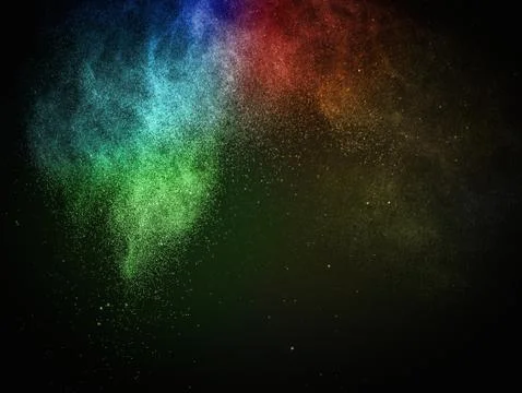 Colourful powder exploding isolated on black Stock Photos
