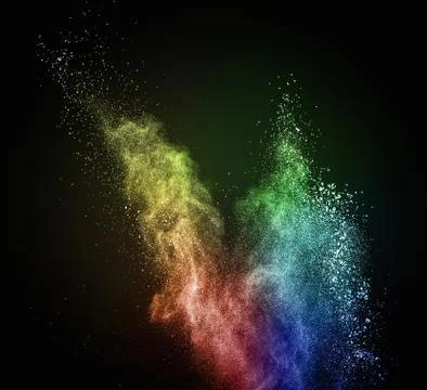 Colourful powder exploding isolated on black 库存照片