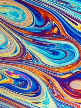 Colourful psychedelic soap bubble refractions pattern macro. Stock Photos