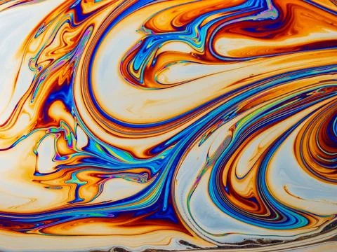 Colourful psychedelic soap bubble refractions pattern macro. Stock Photos