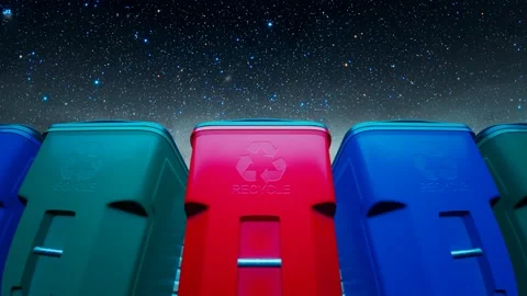 Colourful recycle trash bins against the stary night sky. Ecology. Eco-house. Stock Footage