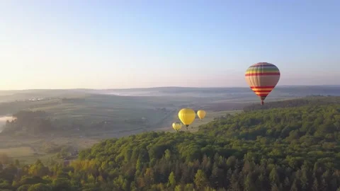 Colourful Red Blue Yellow Colours Hot Air Baloons Aerial Drone Flight Over Stock Footage 144561663
