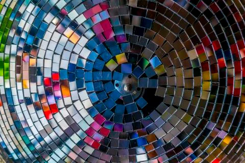 Colourful reflections in a disco ball. Stock Photos
