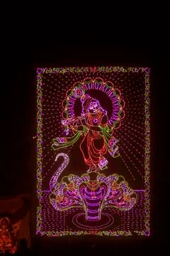 Colourful representation of god krishna using led lights, ganesh festival, pu Stock Photos