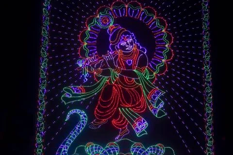 Colourful representation of god krishna using led lights, ganesh festival, pu Stock Photos