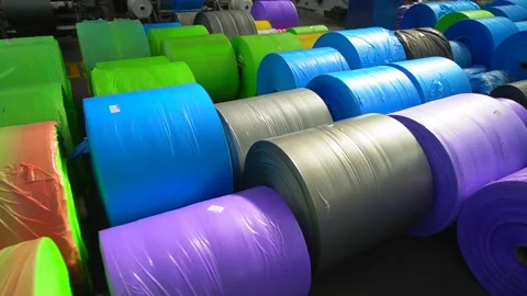 Colourful Rolls of plastic sheeting Stock Footage 169481470
