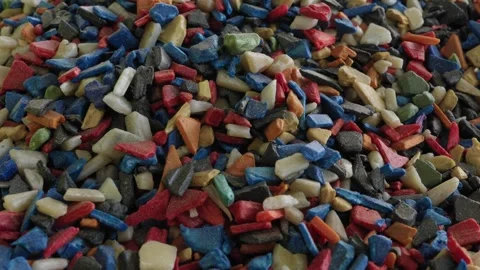 Colourful Shredded Plastic Regrind Flakes Close Up At Recycling Factory Stock Footage 343892484