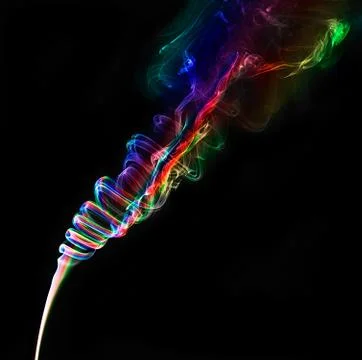 Colourful smoke on black background Stock Photos