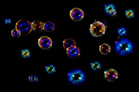 Colourful Soap bubbles on black Stock Photos
