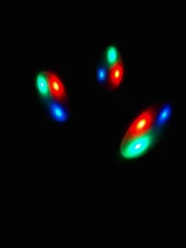 Colourful sphere light in dark background Foto stock