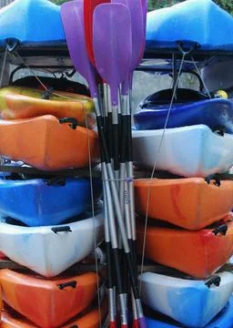Colourful stack of kayaks 스톡 사진