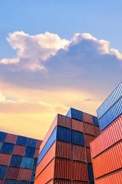 Colourful stack pattern of cargo shipping containers in shipping yard Photos