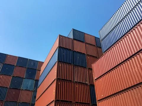 Colourful stack pattern of cargo shipping containers in shipping yard Stock Photos