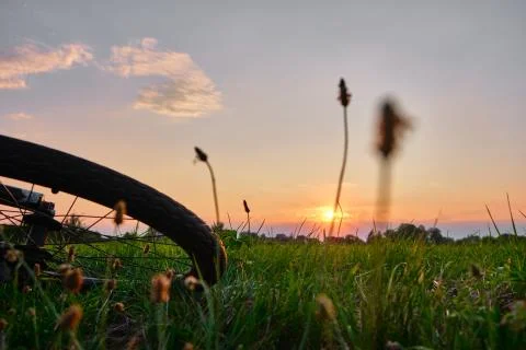 Colourful sunset with cloud development and light shining through Stock Photos