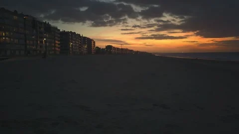 Colourful sunset on a empty beach Stock Footage 330239356