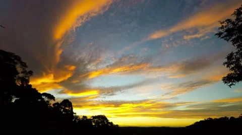 Colourful Sunset over the Hills Stock Footage 64335584