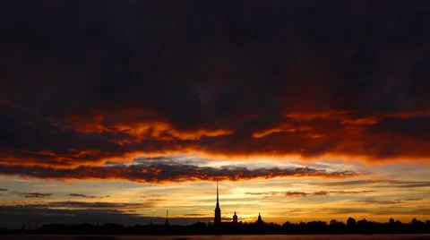 Colourful sunset over Peter and Paul Fortress, dark clouds quickly slide at top Video stock 65210728