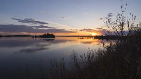 Colourful sunset in Spring at Astotin Lake, Elk Island National Park, Alberta, Stock Photos