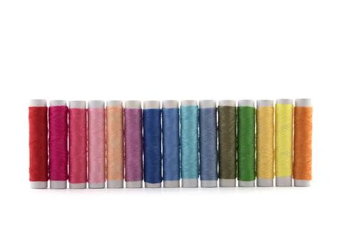 Colourful thread spools on white background with clipping path Stock Photos