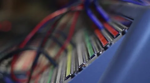 Colourful Wires Plugged Into Desk Focus Pull Stock Footage 50244769