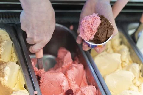 Colse-up image of a hands preparing an ice cream Stock Photos