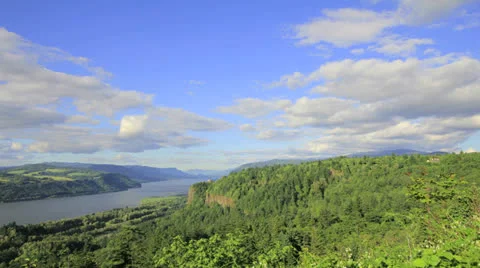 Columbia River Gorge with White Clouds and Blue Sky Timelapse Stock Footage 24567707