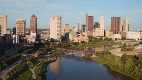 COLUMBUS, AERIAL SKYLINE SHOT, PULL BACK  OVER RIVER FROM WEST Stock Footage 77603552