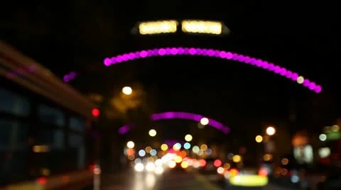 COLUMBUS OHIO, SHORT NORTH ARCHES AT NIGHT, BUSY STREET,  RACK FOCUS Stock Footage