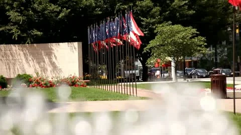 COLUMBUS OHIO, STATEHOUSE FLAGS, RACK FOCUS TO FOUNTAIN Stock Footage 21778779